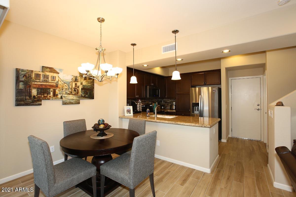 3935 East Rough Rider Road, Unit 1373 Phoenix, AZ 85050 - Photo 17 of 50 Dining Room-Kitchen
