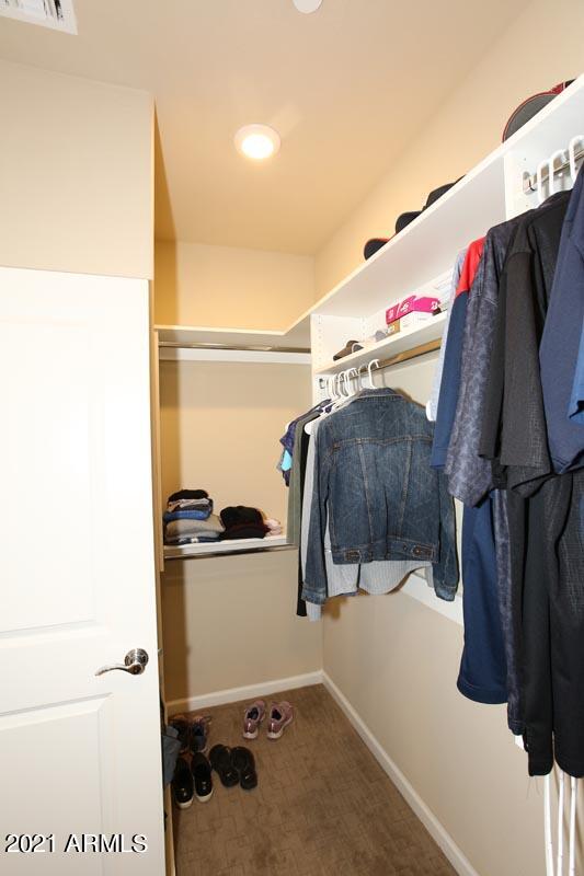 3935 East Rough Rider Road, Unit 1373 Phoenix, AZ 85050 - Photo 25 of 50 Master Walk-in Closet2