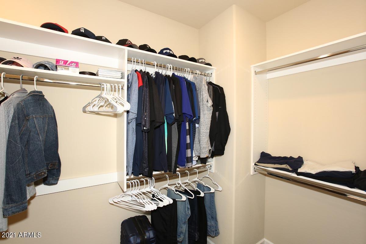 3935 East Rough Rider Road, Unit 1373 Phoenix, AZ 85050 - Photo 26 of 50 Master Walk-in Closet