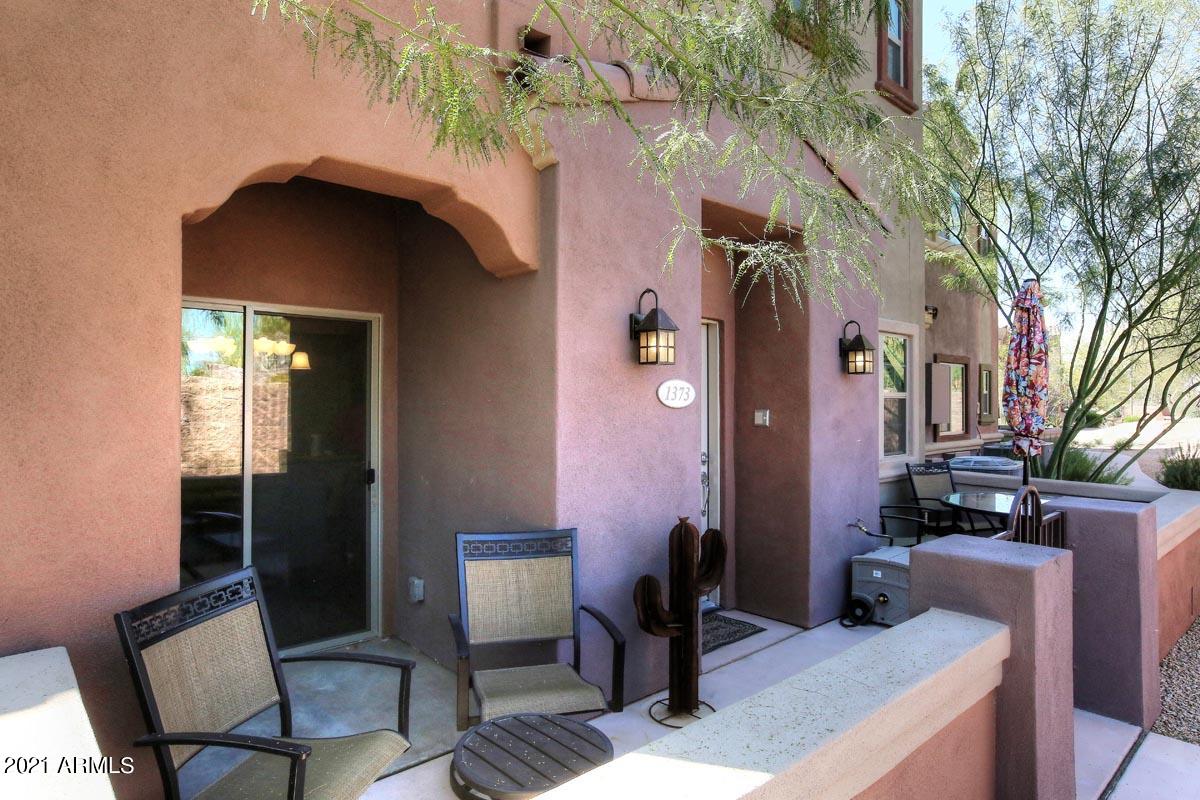 3935 East Rough Rider Road, Unit 1373 Phoenix, AZ 85050 - Photo 29 of 50 Front Patio2