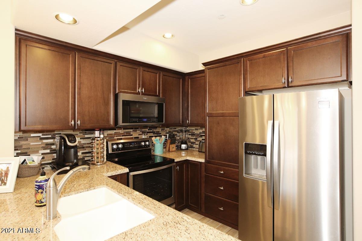 3935 East Rough Rider Road, Unit 1373 Phoenix, AZ 85050 - Photo 5 of 50 Kitchen2