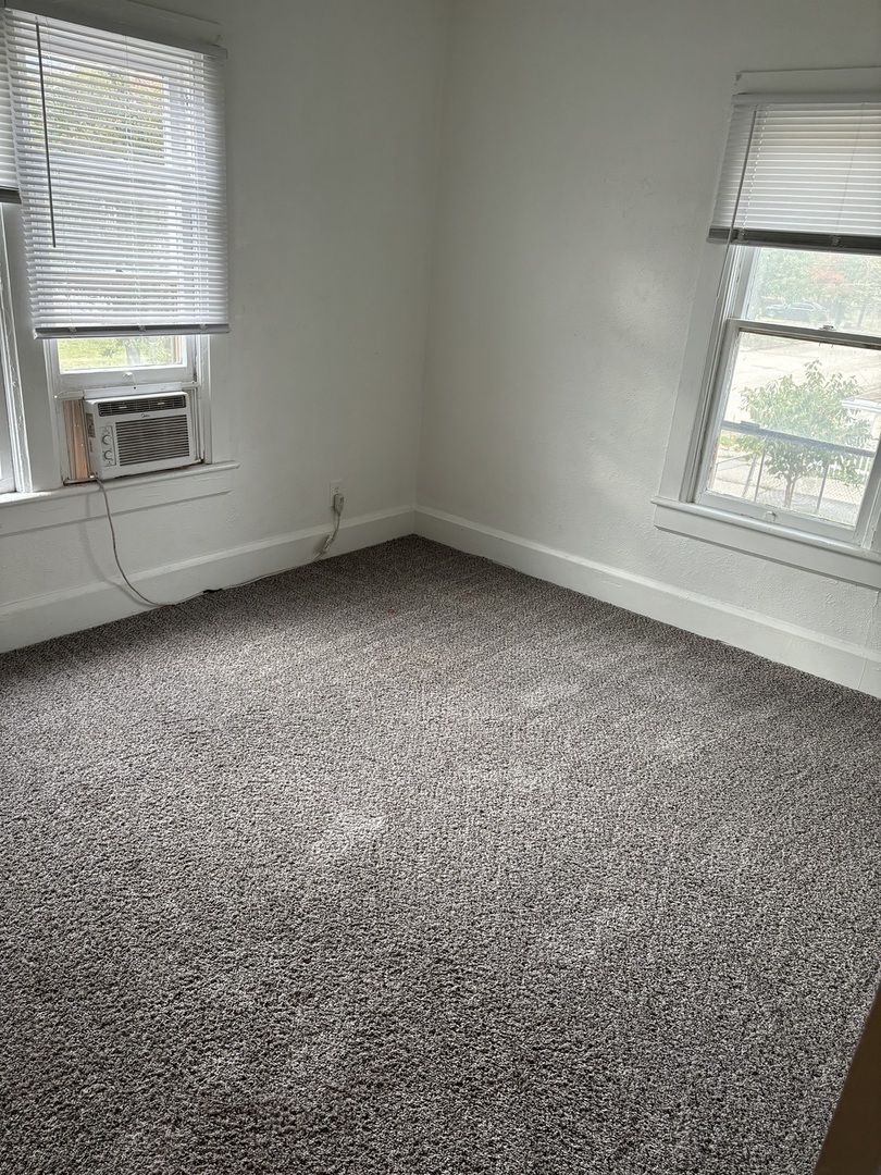 322 Pine Street Joliet, IL 60435 - Photo 11 of 11 an empty room with a window