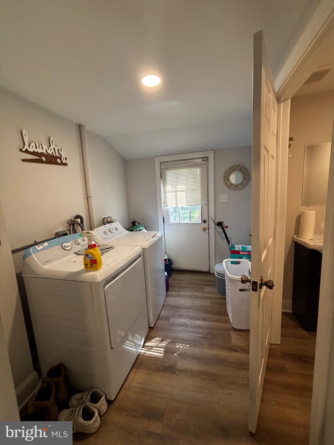 4 3rd Street Brookhaven, PA 19015 - Photo 11 of 21 a living room with furniture a dining table and wooden floor