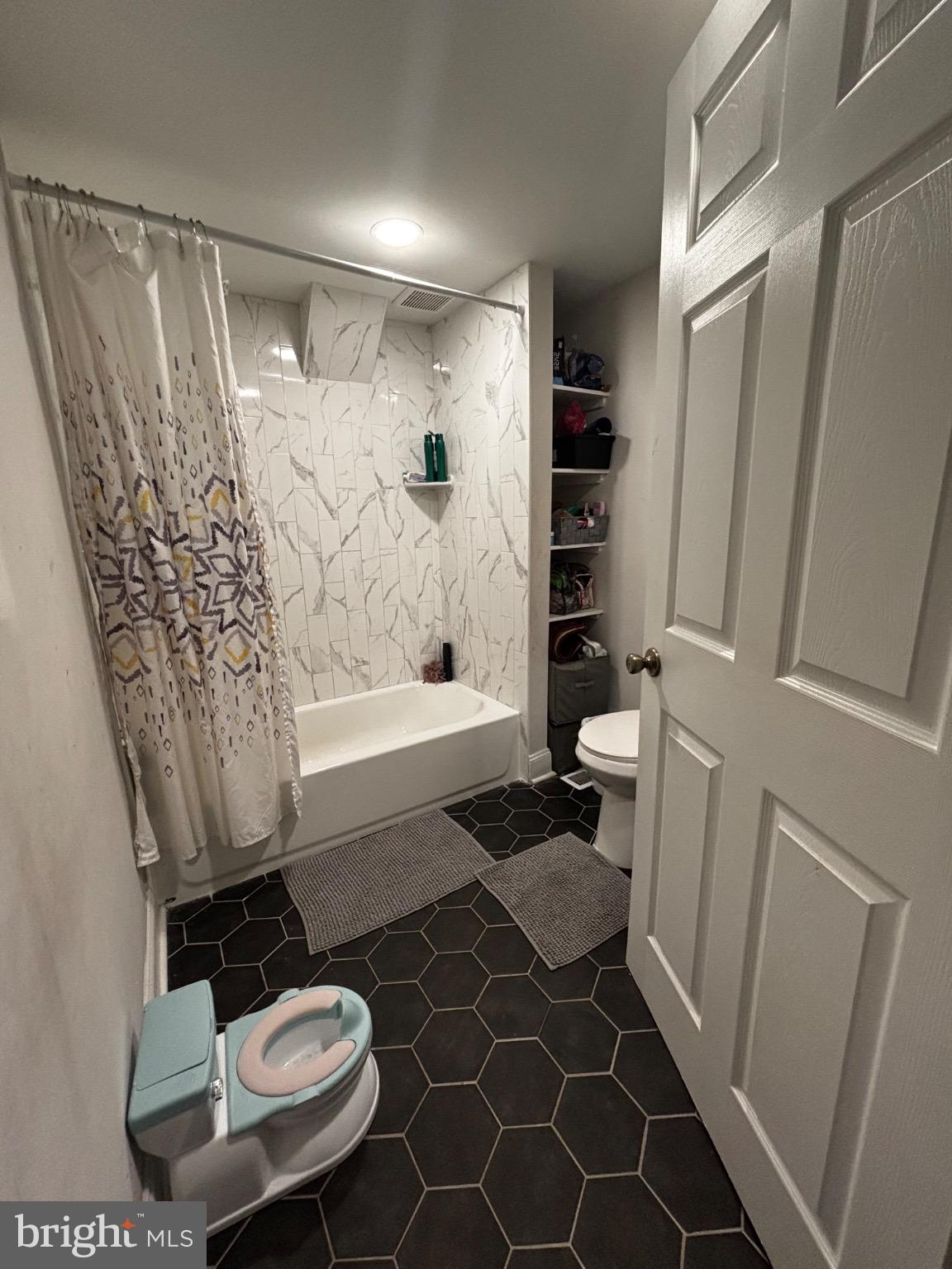 4 3rd Street Brookhaven, PA 19015 - Photo 14 of 21 a bathroom with a sink toilet and shower