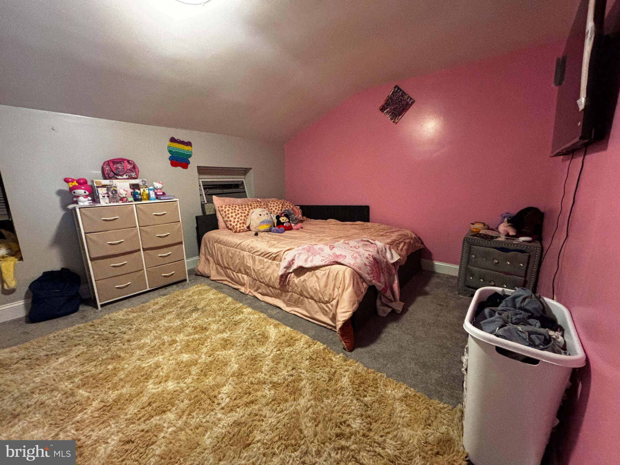 4 3rd Street Brookhaven, PA 19015 - Photo 20 of 21 a bedroom with a bed and a couch