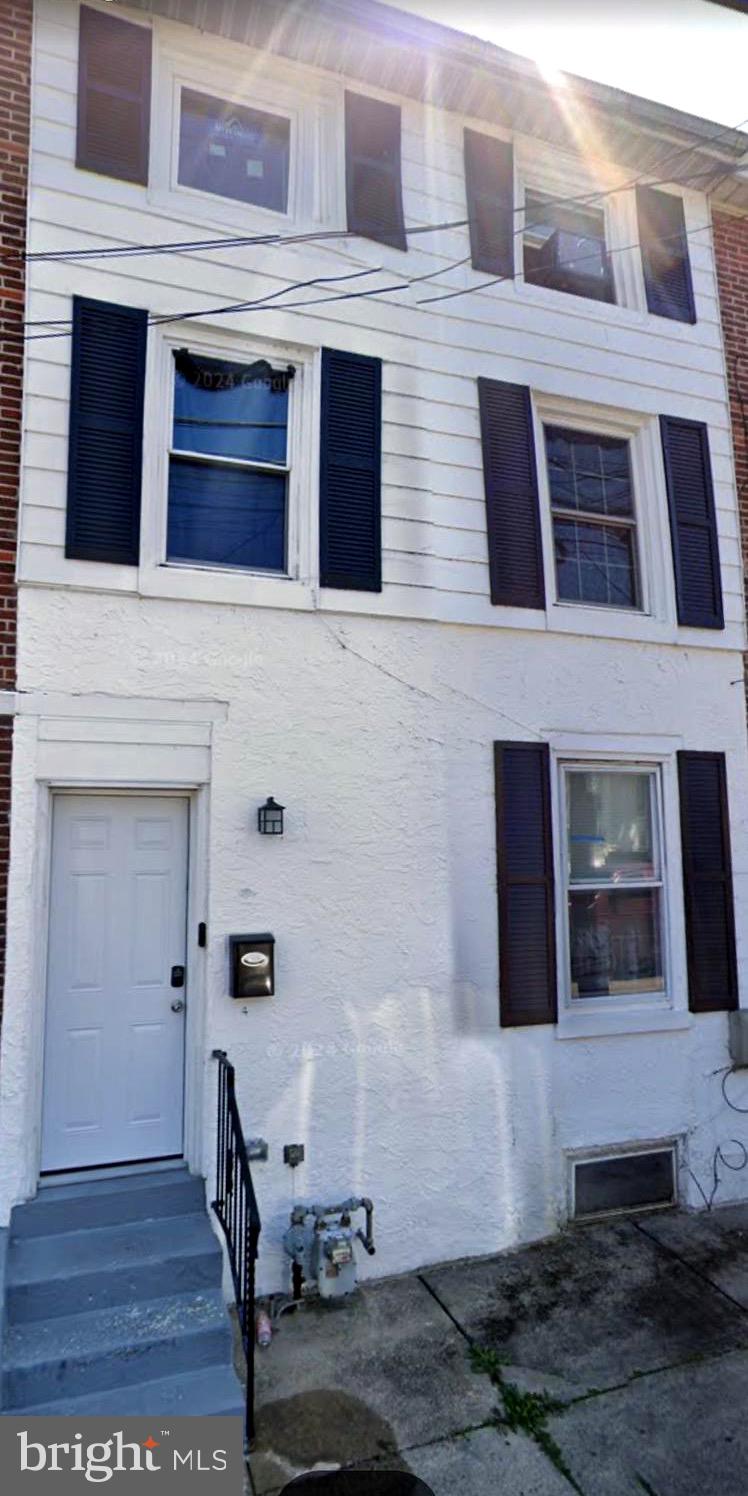 4 3rd Street Brookhaven, PA 19015 - Photo 21 of 21 a front view of a house with a yard