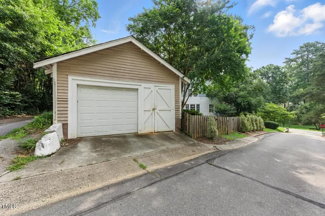 a view of backyard of house garage