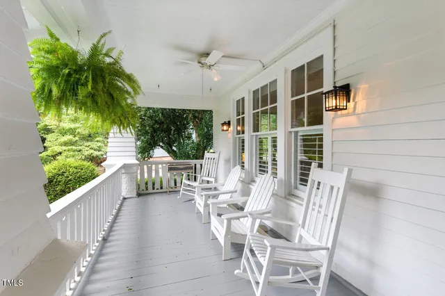 a view of a patio with a table and chairs
