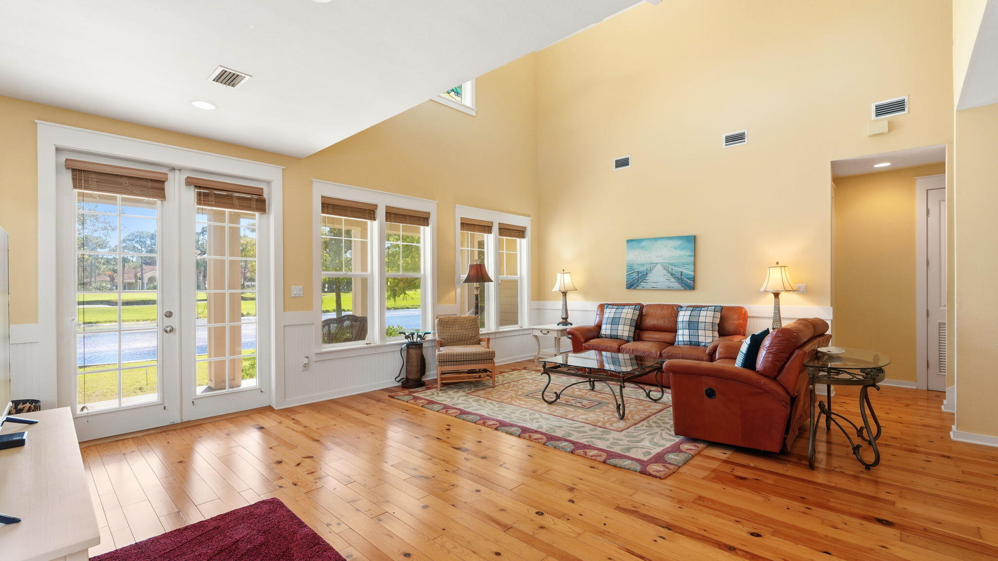 1327 Ravens Run East Miramar Beach, FL 32550 - Photo 12 of 59 a living room with furniture and a large window