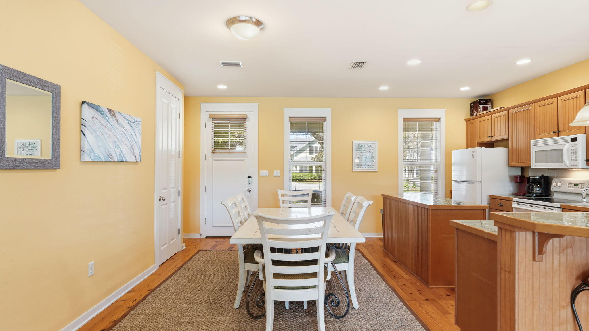 1327 Ravens Run East Miramar Beach, FL 32550 - Photo 17 of 59 a dining room with furniture and a window