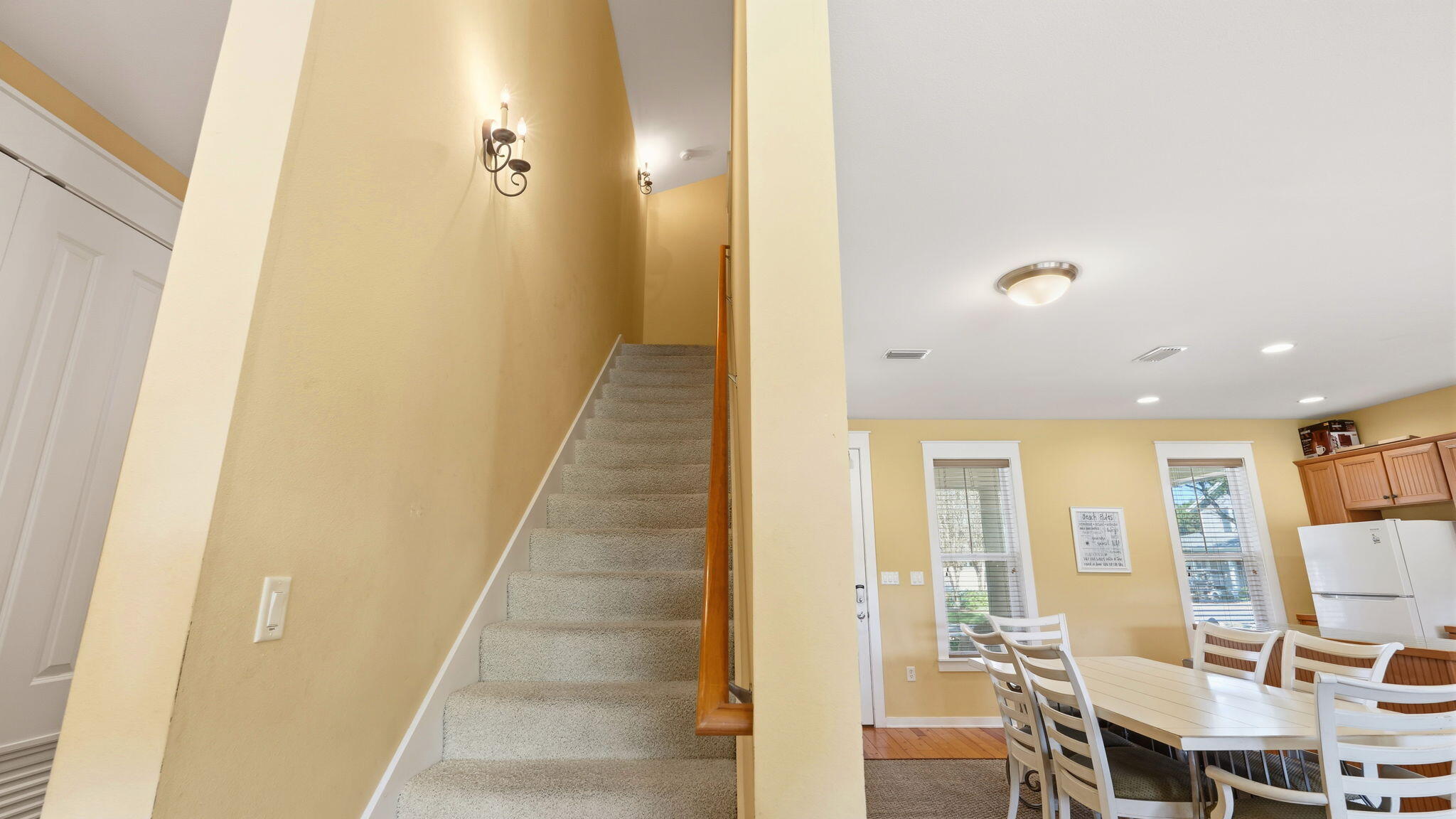 1327 Ravens Run East Miramar Beach, FL 32550 - Photo 21 of 59 a view of a hallway with furniture and entryway