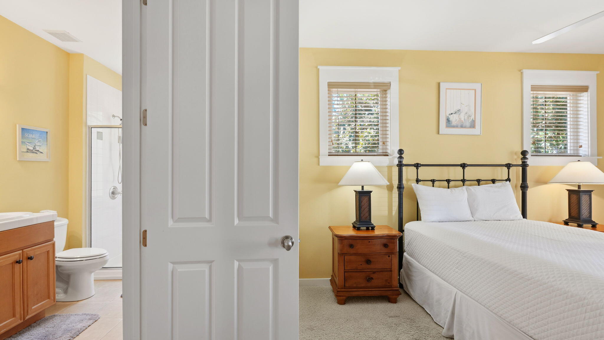 1327 Ravens Run East Miramar Beach, FL 32550 - Photo 27 of 59 a bed room with a bed and a lamp