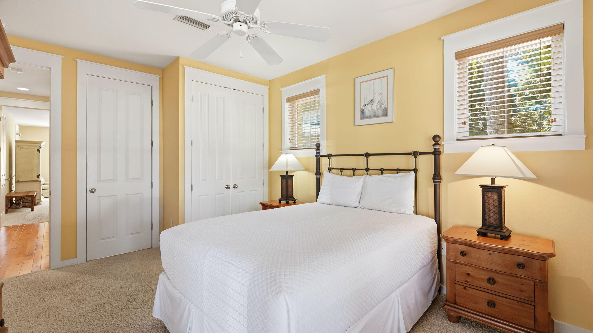 1327 Ravens Run East Miramar Beach, FL 32550 - Photo 29 of 59 a bedroom with a bed and a night stand