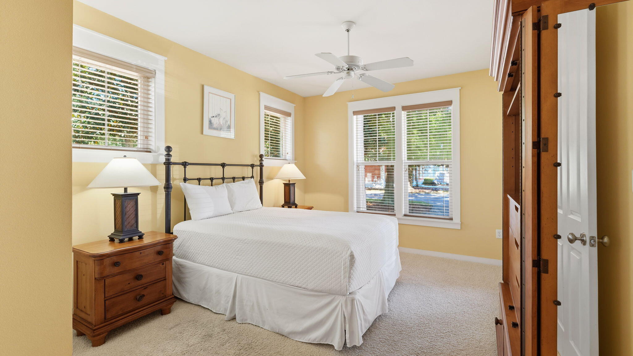 1327 Ravens Run East Miramar Beach, FL 32550 - Photo 30 of 59 a bedroom with a bed and a window