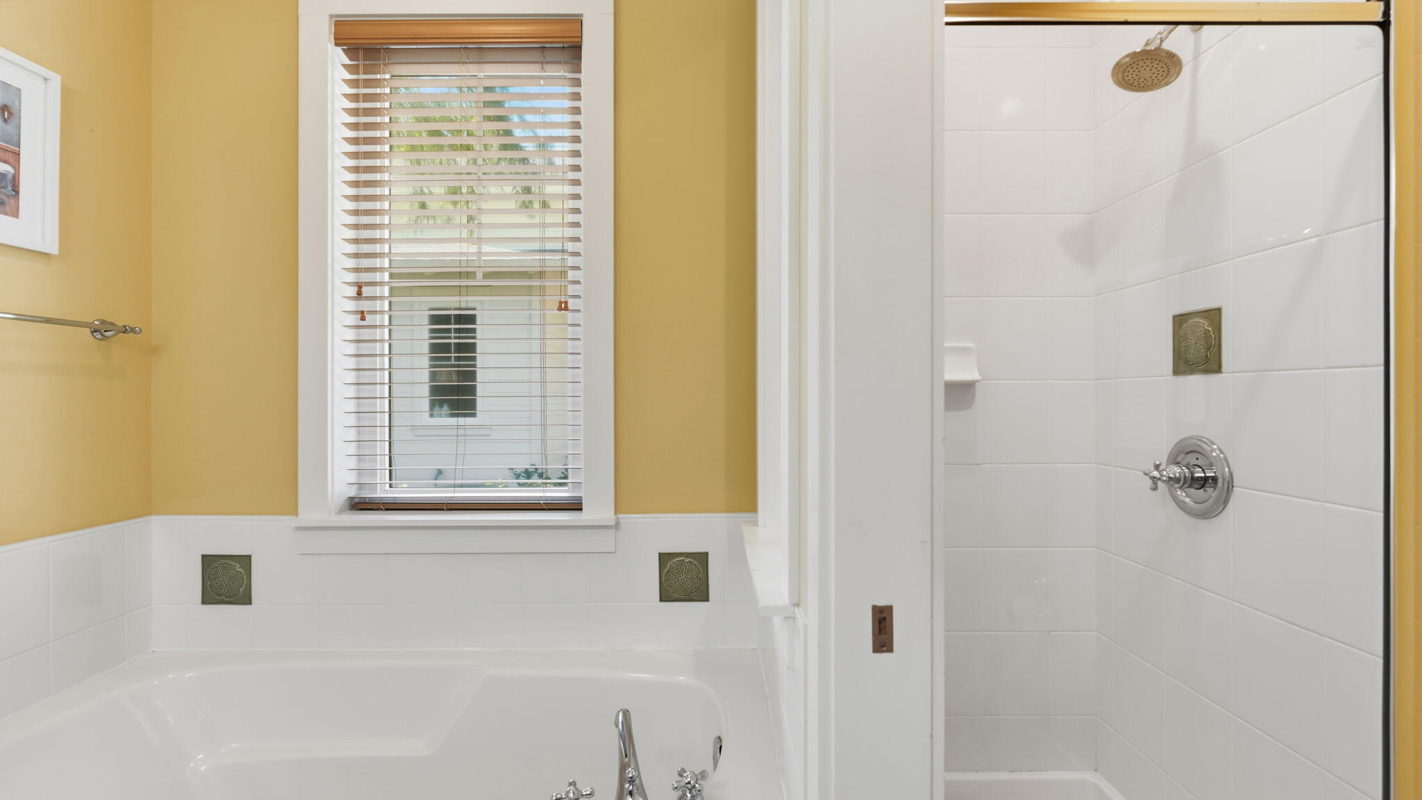 1327 Ravens Run East Miramar Beach, FL 32550 - Photo 34 of 59 a bathroom with a bathtub and shower