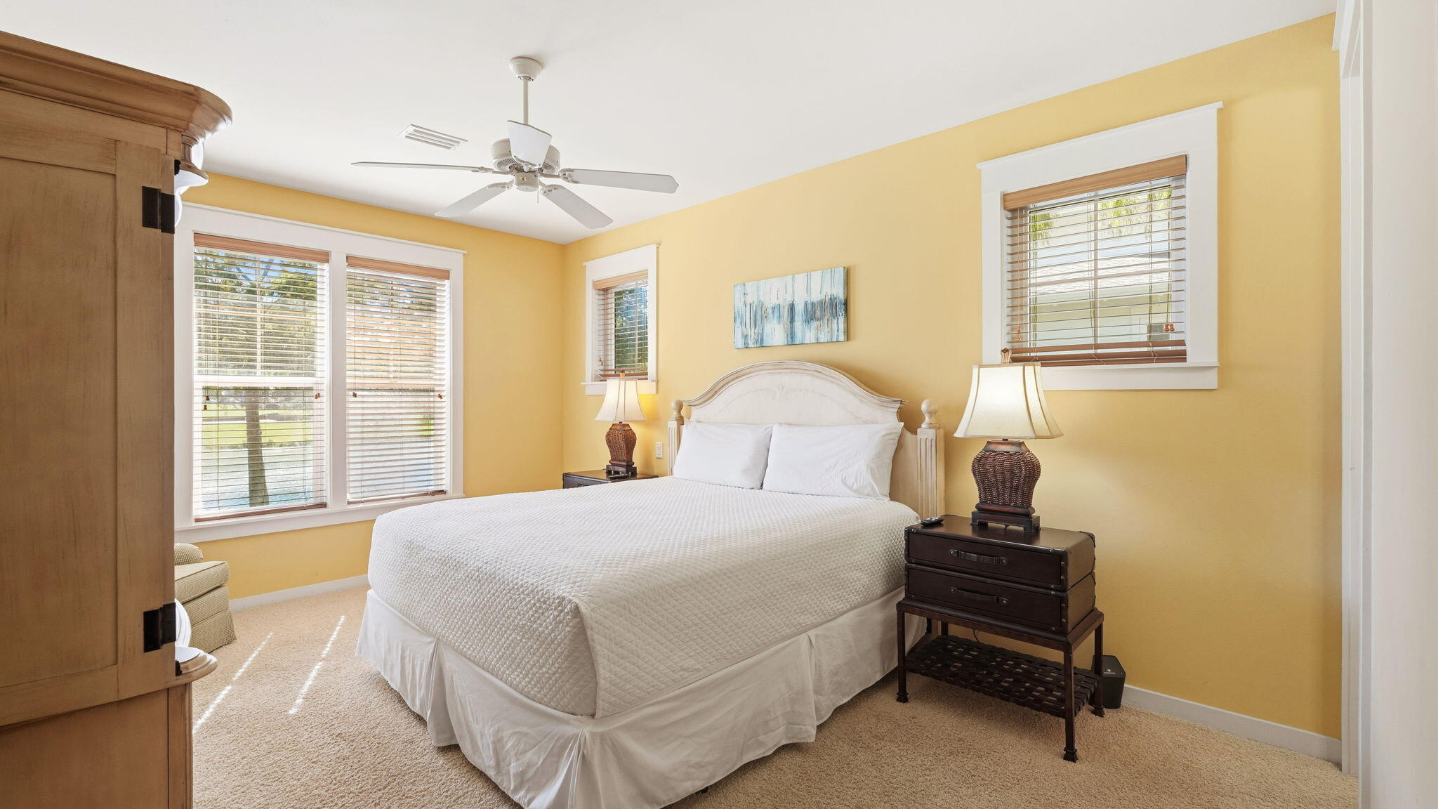 1327 Ravens Run East Miramar Beach, FL 32550 - Photo 37 of 59 a bedroom with a bed and a window