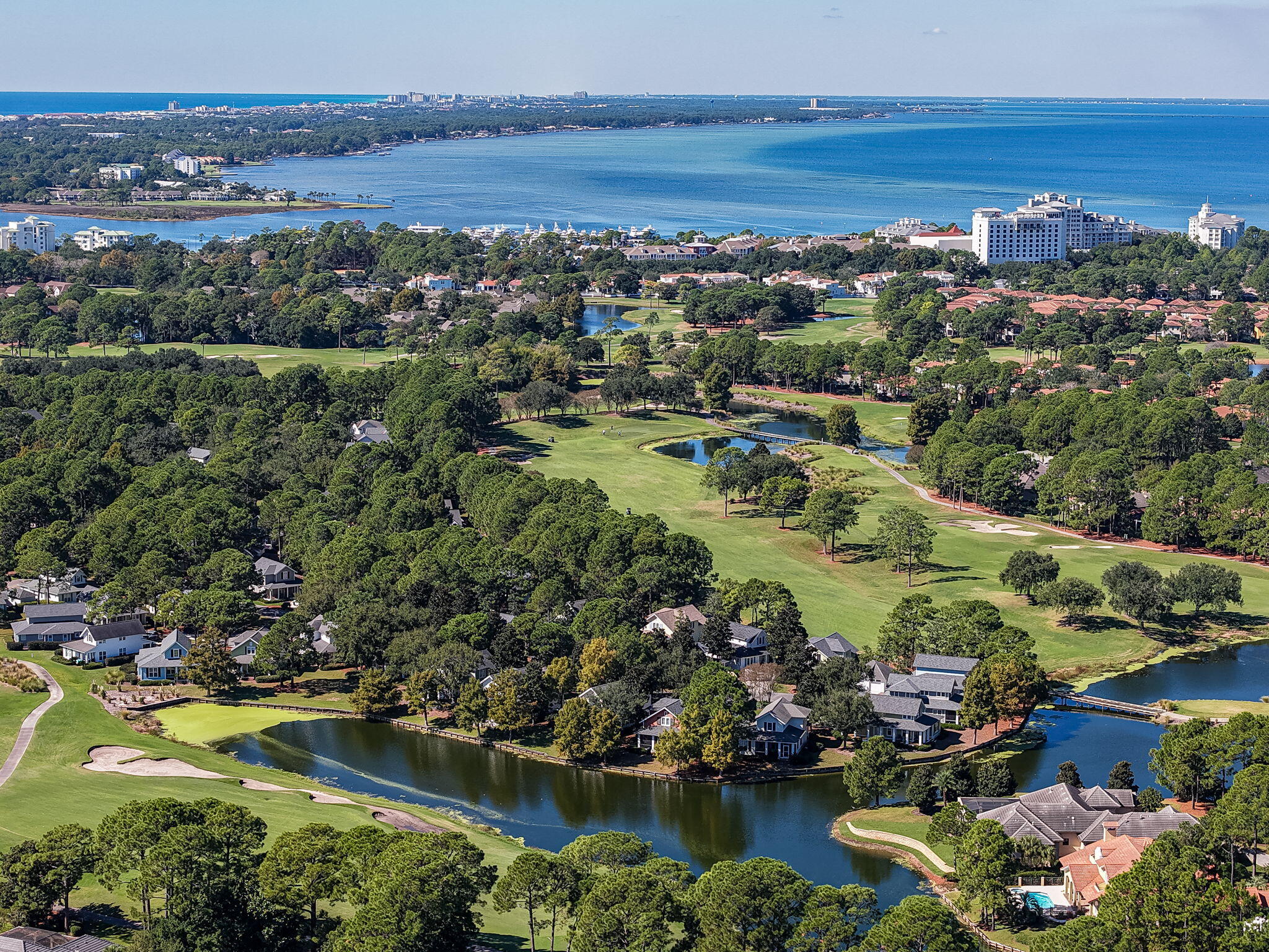 1327 Ravens Run East Miramar Beach, FL 32550 - Photo 44 of 59 an aerial view of residential houses with outdoor space and lake view