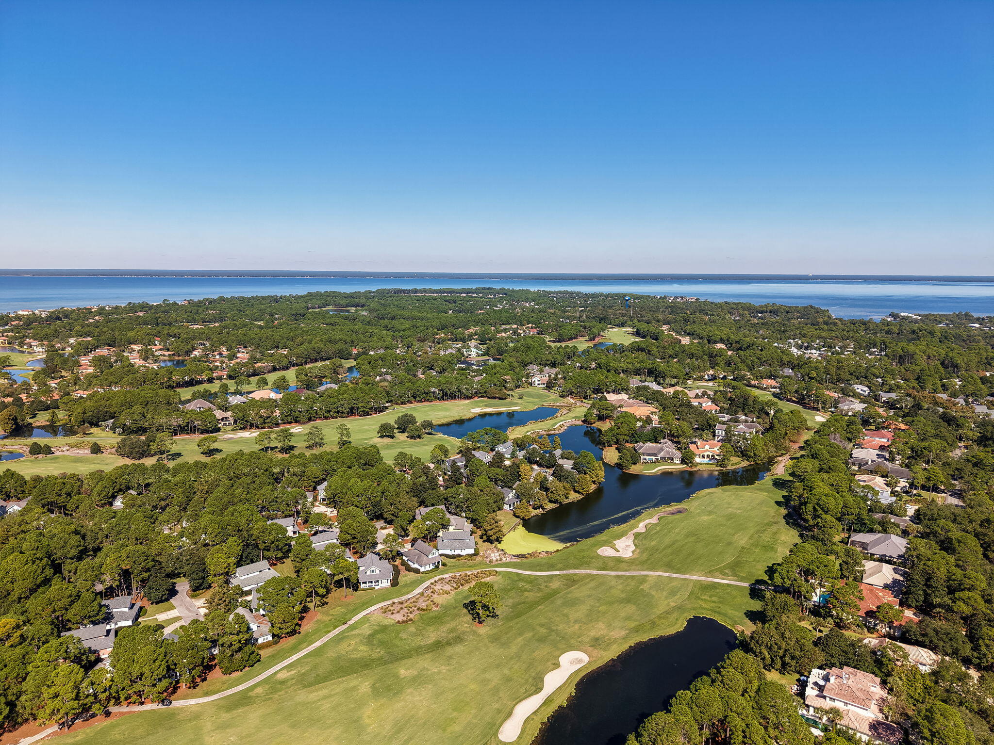 1327 Ravens Run East Miramar Beach, FL 32550 - Photo 47 of 59 an aerial view of residential houses with outdoor space