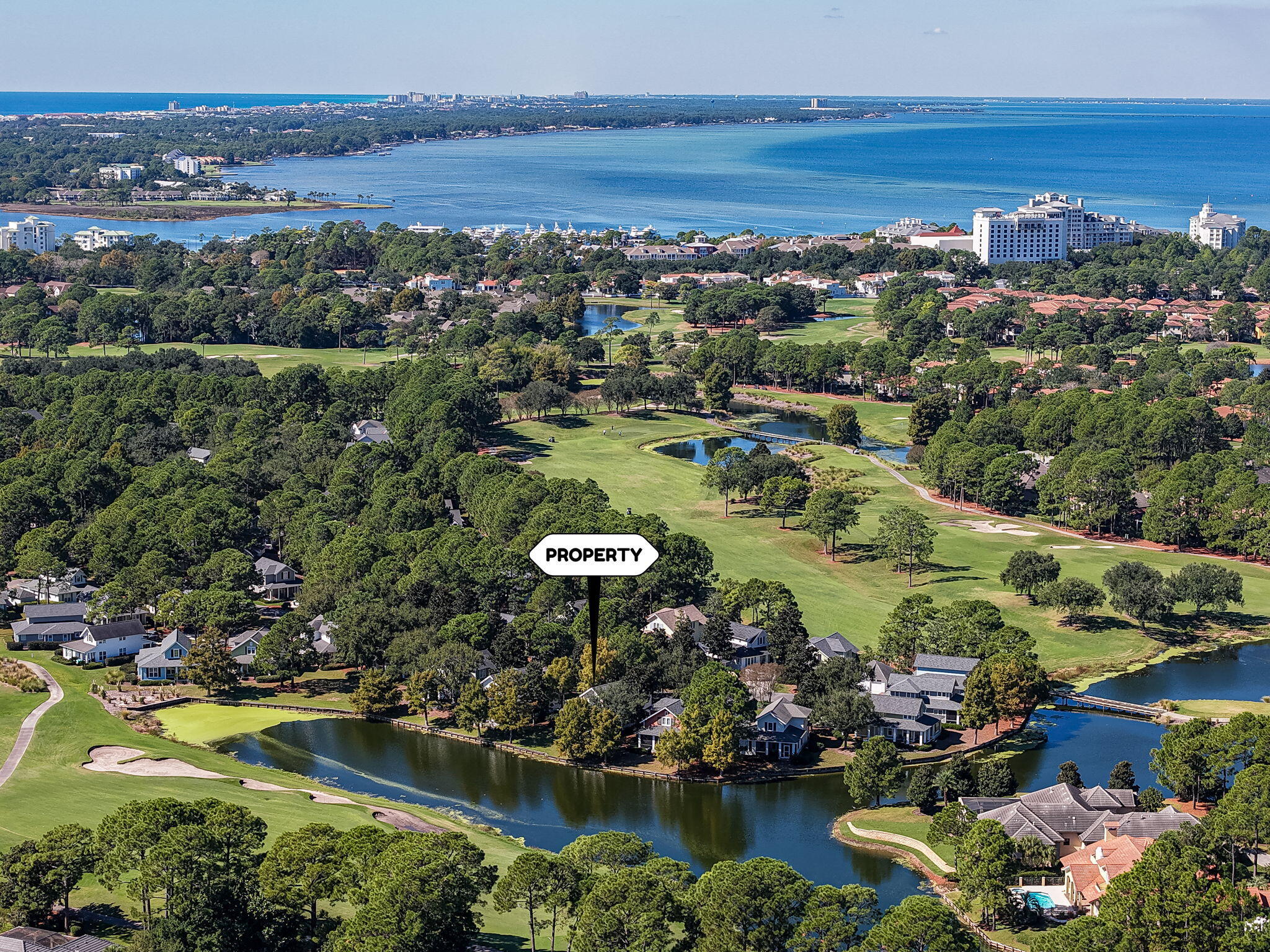 1327 Ravens Run East Miramar Beach, FL 32550 - Photo 54 of 59 an aerial view of residential houses with outdoor space