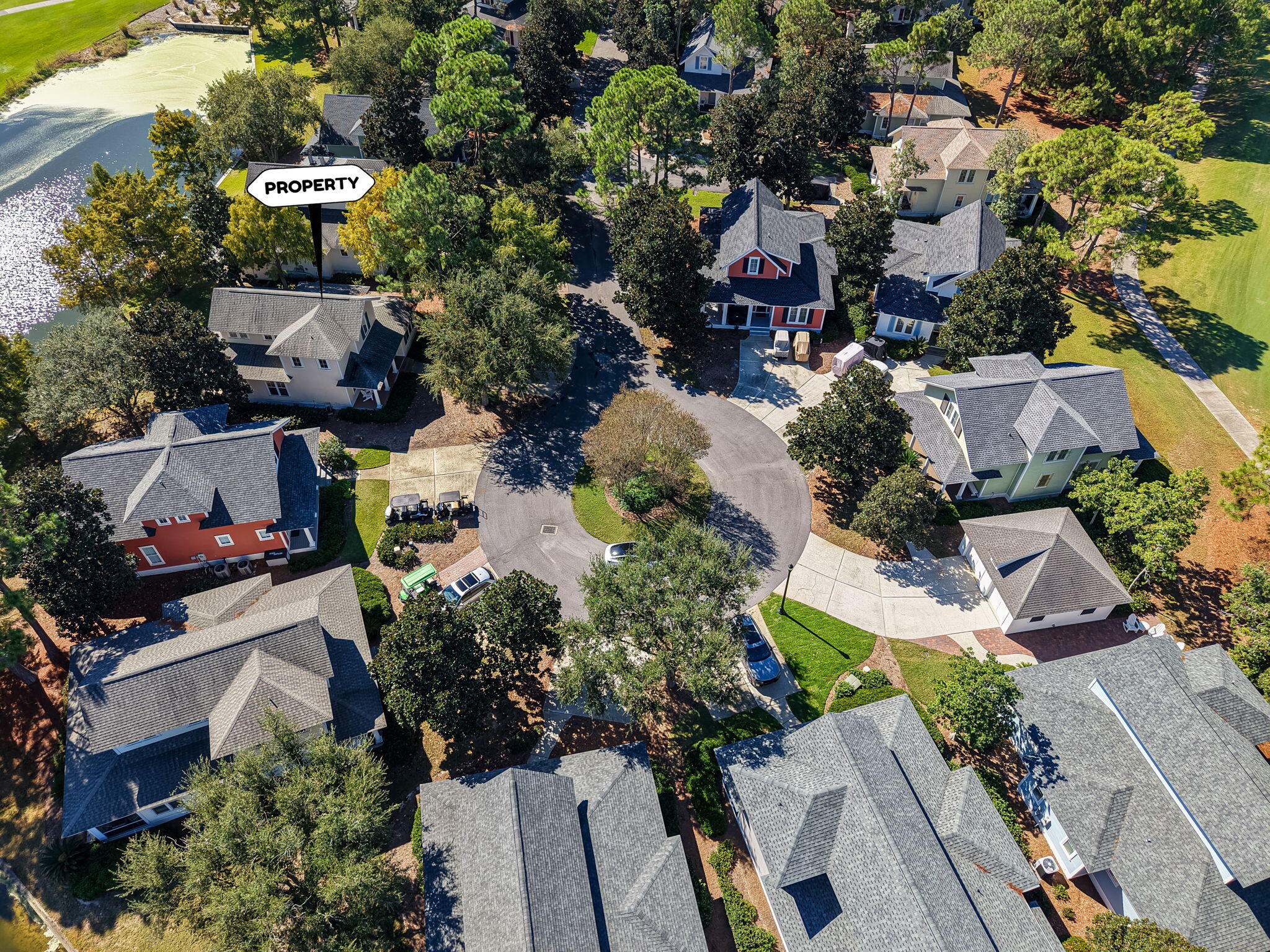 1327 Ravens Run East Miramar Beach, FL 32550 - Photo 57 of 59 an aerial view of multiple houses with yard