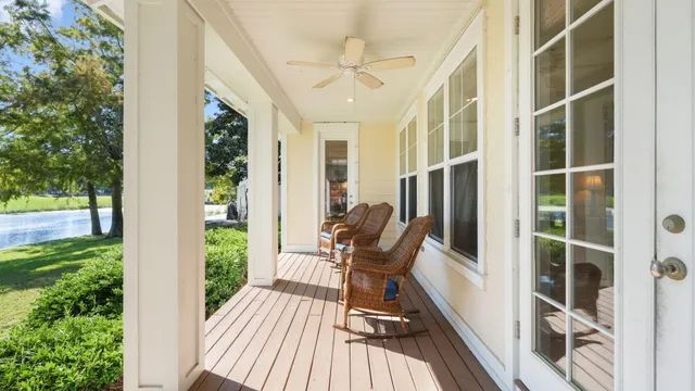 a view of balcony with furniture and garden