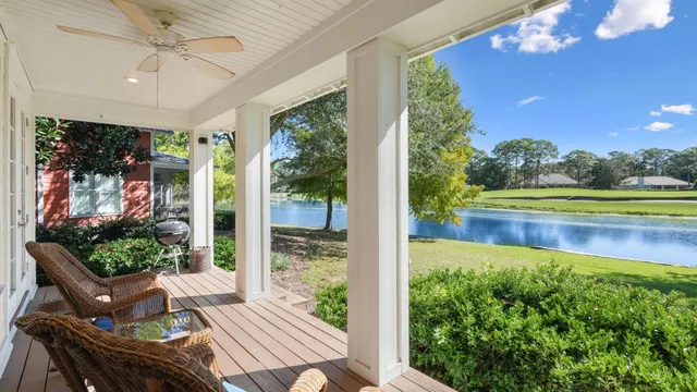 a view of swimming pool with seating space