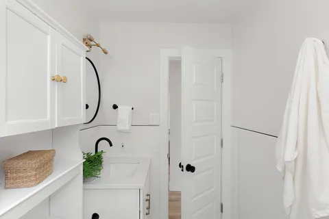 a bathroom with a shower and a tub