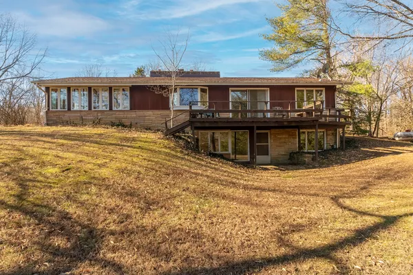 a view of a house with a swimming pool