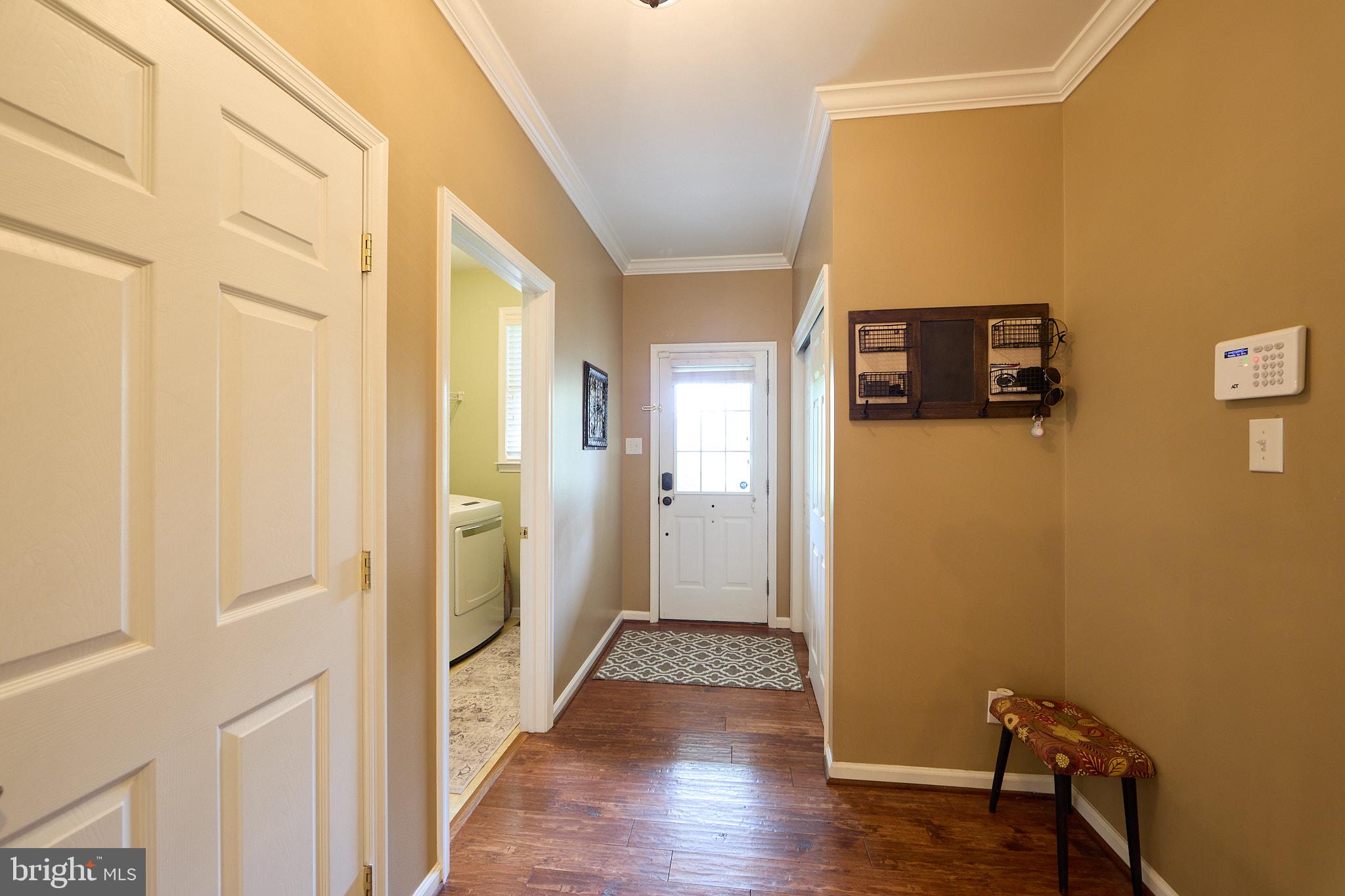 661 St Matthews Road Chester Springs, PA 19425 - Photo 23 of 64 Welcoming entryway with warm tones.