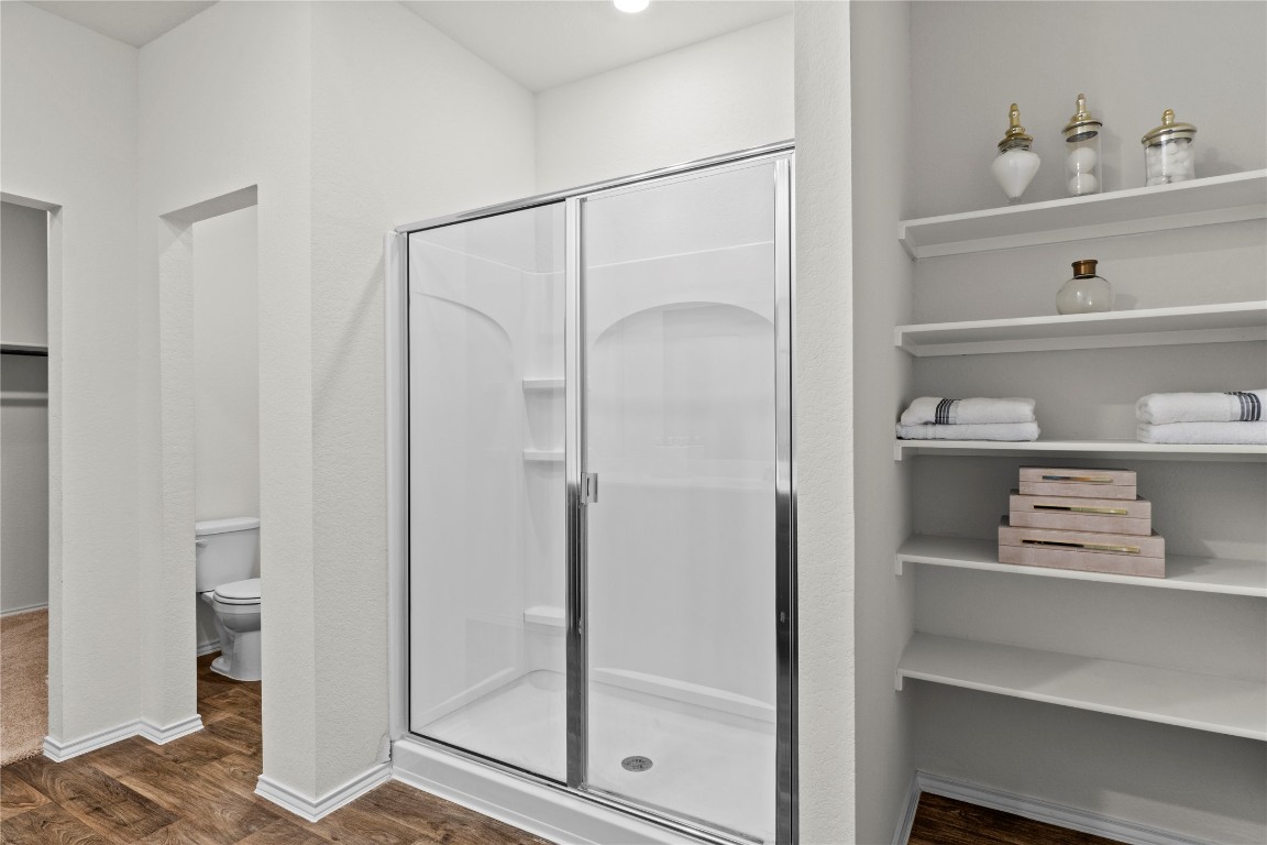 14806 Bajada Road Manor, TX 78653 - Photo 15 of 28 a bathroom with a shower