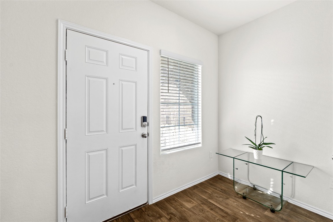 14806 Bajada Road Manor, TX 78653 - Photo 17 of 28 a view of entryway with wooden floor