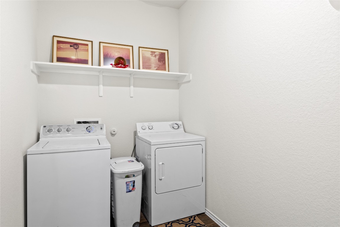 14806 Bajada Road Manor, TX 78653 - Photo 25 of 28 a utility room with dryer and washer