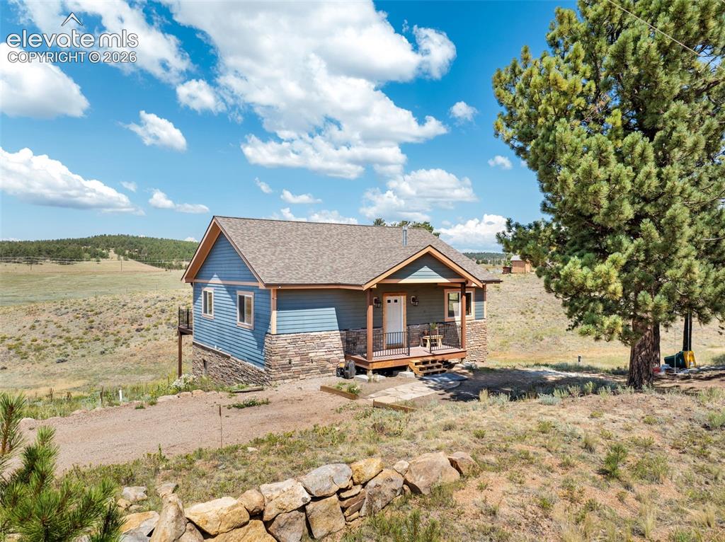 351 High Pasture Road Florissant, CO 80816 - Photo 2 of 39 Set on a beautiful lot with open views.