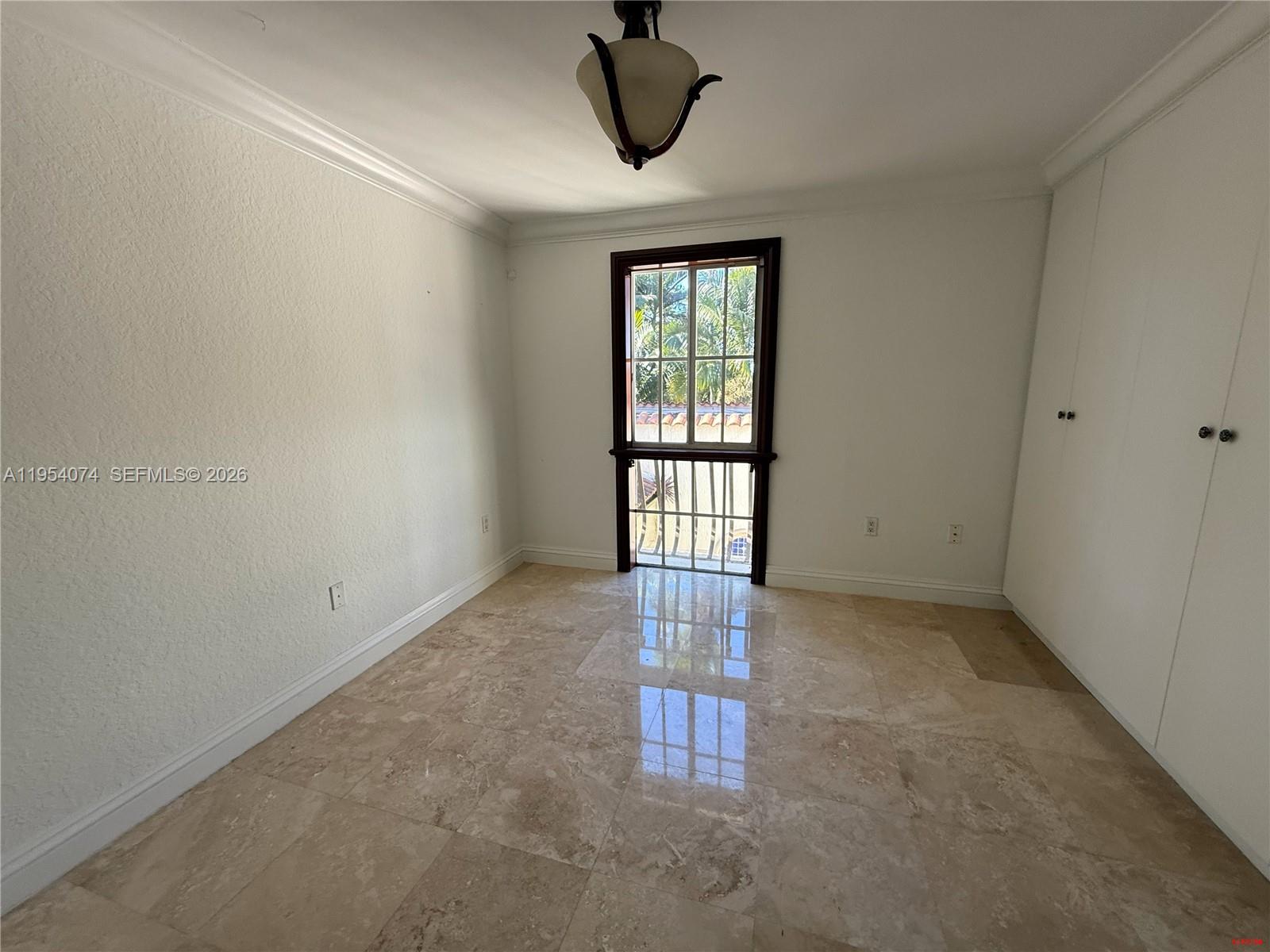 19950 Southwest 228th Street Miami, FL 33170 - Photo 14 of 24 an empty room with windows