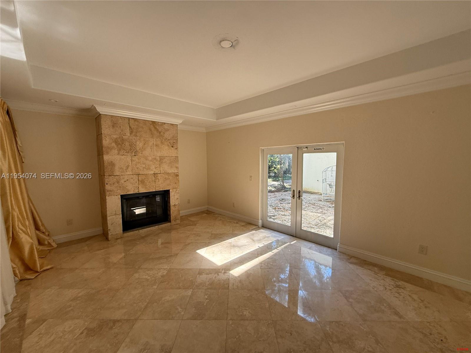 19950 Southwest 228th Street Miami, FL 33170 - Photo 3 of 24 an empty room with windows