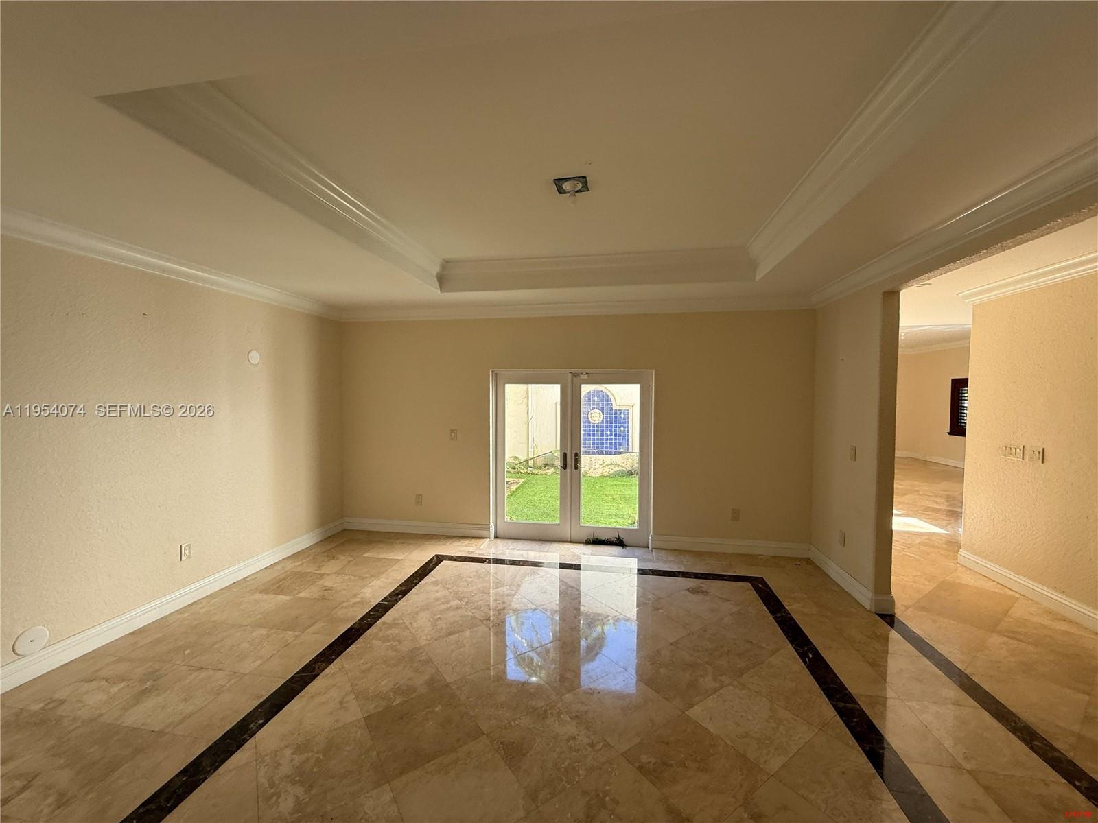 19950 Southwest 228th Street Miami, FL 33170 - Photo 4 of 24 a view of an empty room and window