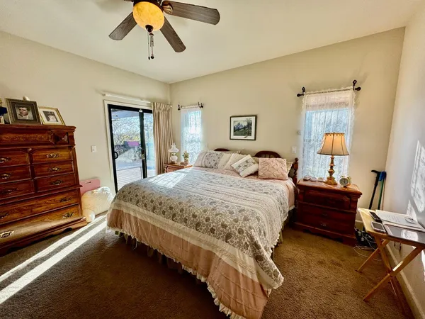 a spacious bathroom with a double vanity sink and a mirror