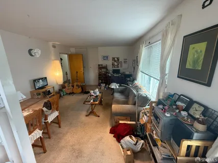 a view of a workspace with furniture and toys