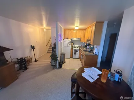 a view of a workspace with furniture