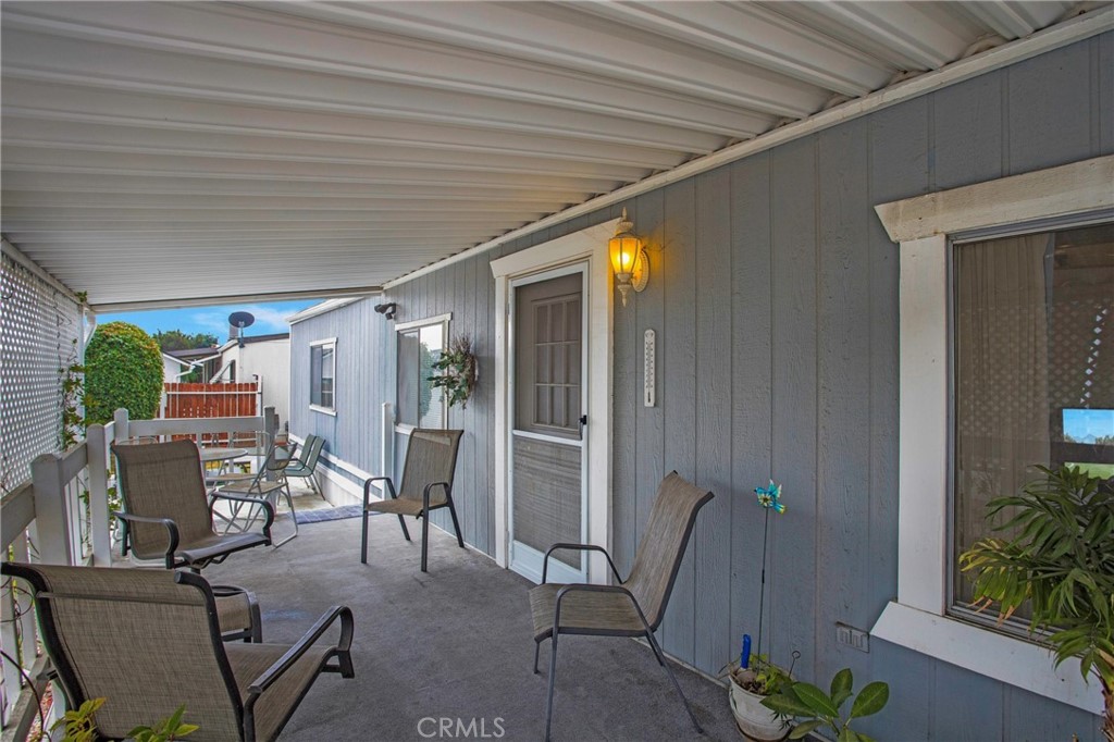 692 North Adele Street, Unit 49 Orange, CA 92867 - Photo 3 of 16 a view of a patio with chairs and potted plants