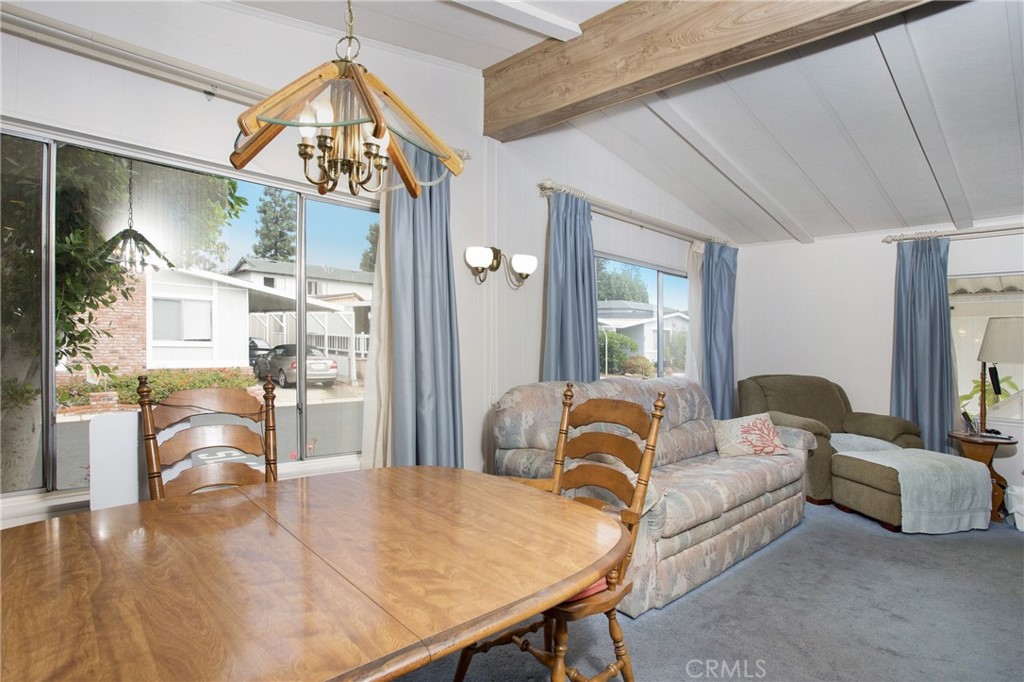 692 North Adele Street, Unit 49 Orange, CA 92867 - Photo 6 of 16 a living room with furniture and a table