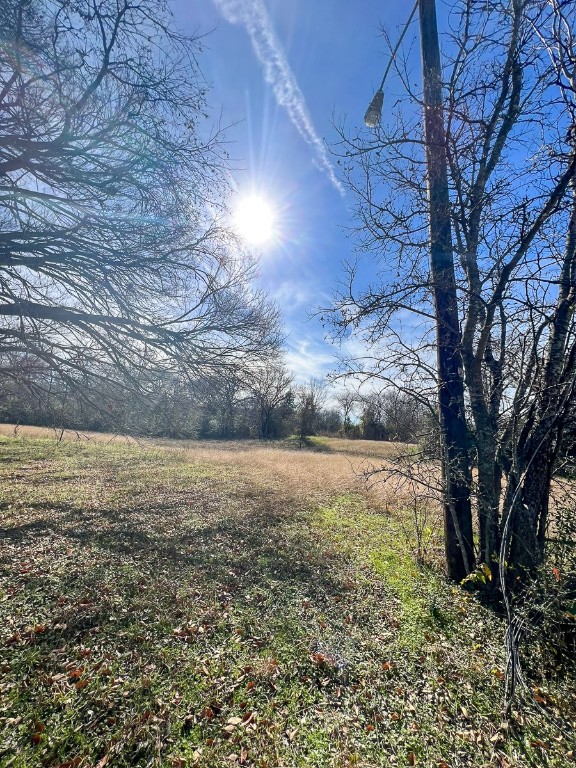 203 Southwest 4th Street Hubbard, TX 76648 - Photo 1 of 4 a view of an outdoor space and trees