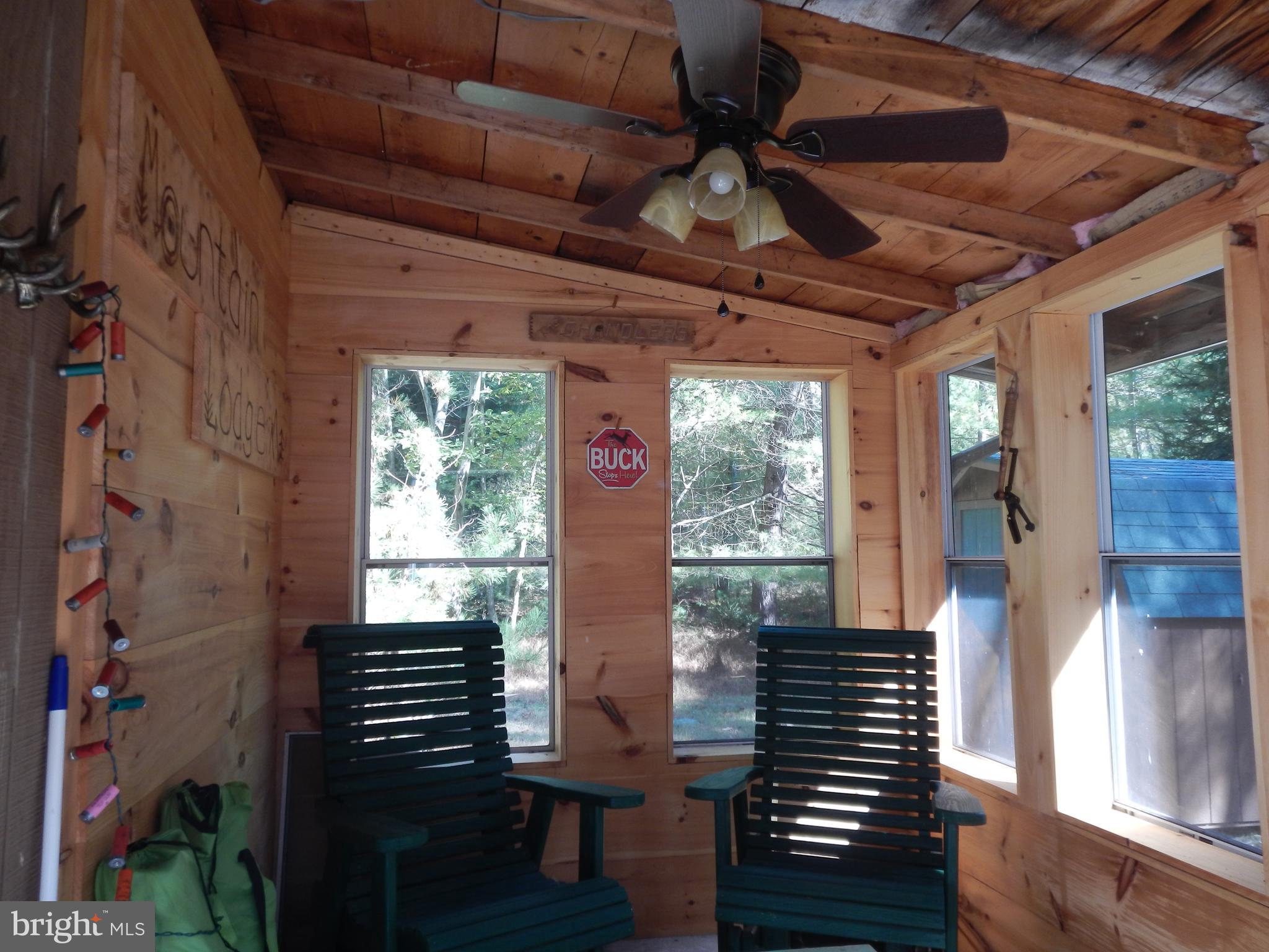 4175 Pine Grove Road Biglerville, PA 17307 - Photo 22 of 30 2nd view of enclosed rear porch, view of the wood