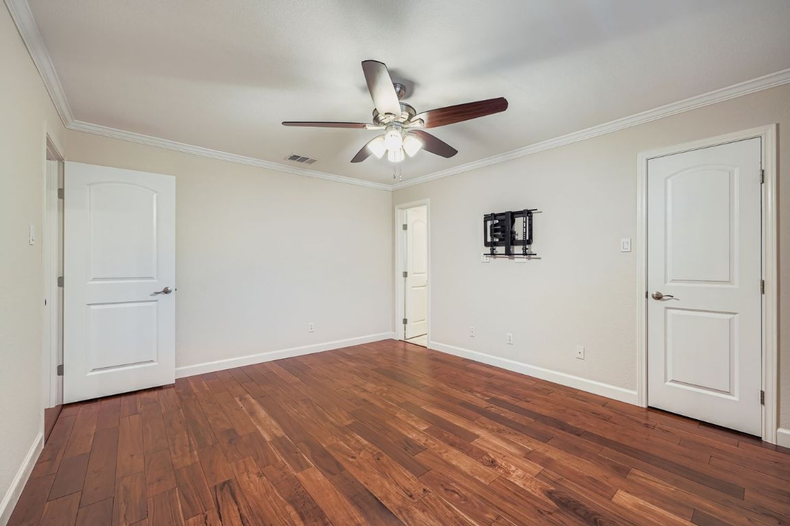 7202 Beckett Road Austin, TX 78749 - Photo 14 of 28 wooden floor in an empty room