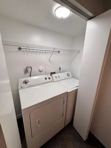 a utility room with dryer and washer