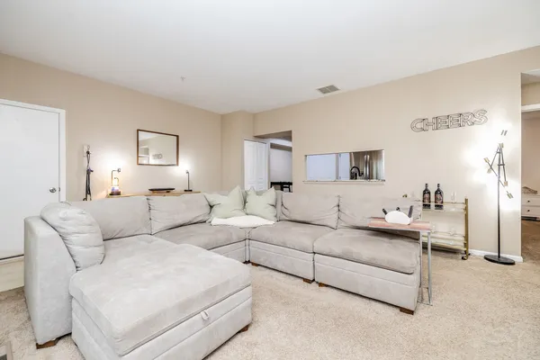 a living room with furniture and a couch