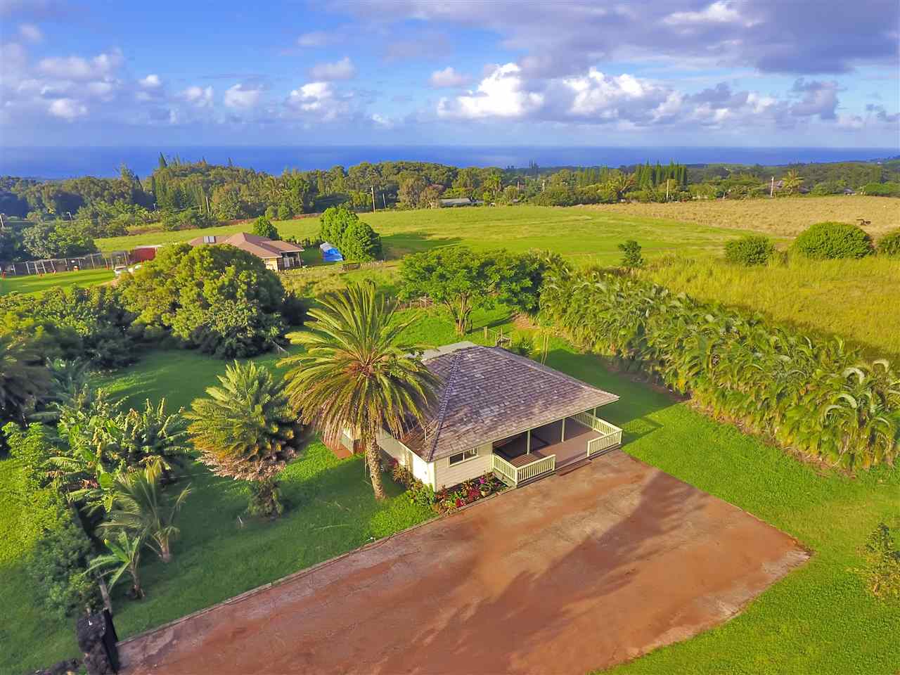 1855 B Kauhikoa Road Haiku, HI 96708 - Photo 1 of 30 a view of a city with an ocean