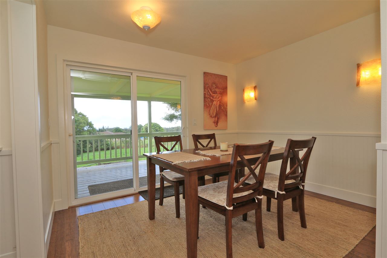 1855 B Kauhikoa Road Haiku, HI 96708 - Photo 6 of 30 a view of a dining room with furniture and wooden floor