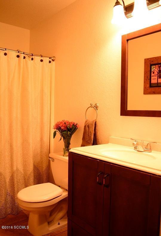 1032 Via Independencia Rio Rico, AZ 85648 - Photo 22 of 22 a bathroom with a sink and a toilet
