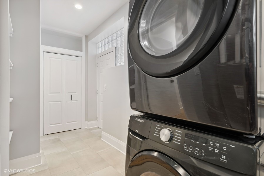 2139 West Crystal Street, Unit 1 Chicago, IL 60622 - Photo 24 of 27 a utility room with dryer and washer